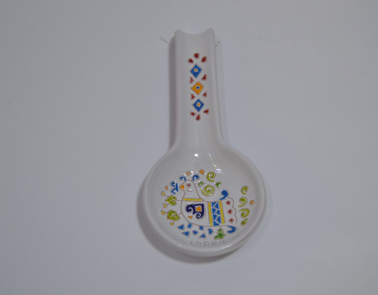 Poggiamestolo in ceramica con decoro pavoncella di ceramiche Loddo
